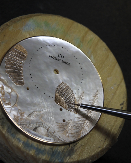 The making of Jaquet Droz Petite Heure Minute Relief Season: painting engraved dial in gold