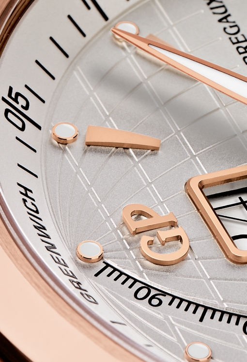 Girard-Perregaux Traveller Large Date, Moon Phases & GMT Longitude Act (dial fragment, logo)